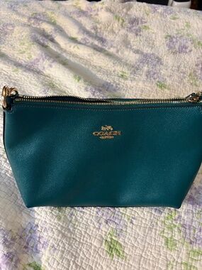 Emerald Green Coach shoulder bag with crossbody strap